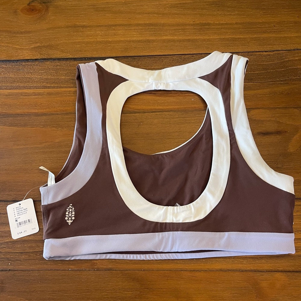 Free people movement workout top. New with tags, size M